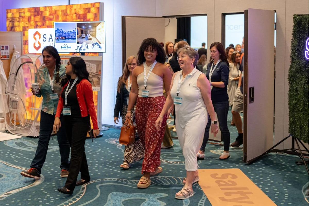 Attendees walking through the STAcon vendor hall.